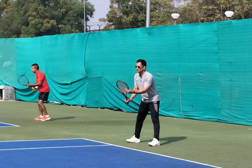 Image result for dhoni plays tennis